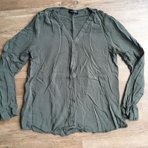 Olive tunic with brass stud detailing on shoulder